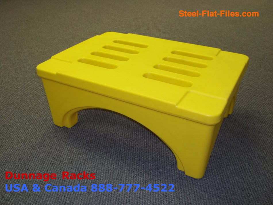 Yellow dunnage racks plastic for alert heads up safety awareness on a busy materials handling floor.