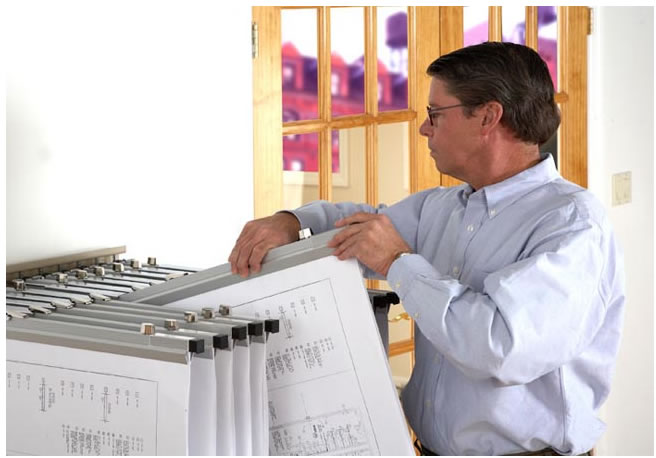 Pivot wall racks make the most of available room space, and conveniently permit archival and retrieval resources at hand.
